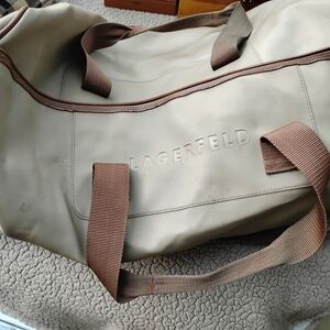 Stylish Tan and Brown Duffel Bag with Leather Accents